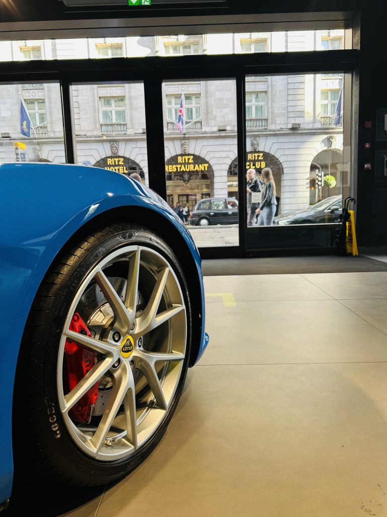 A bright blue Lotus in the Mayfair showroom